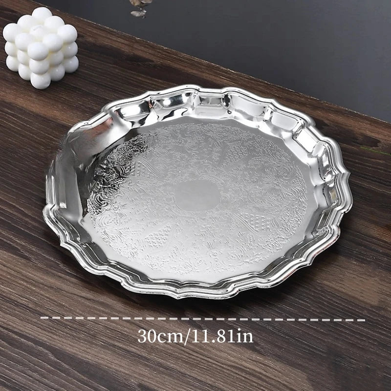 Grand plateau argenté ciselé, diamètre 30 cm