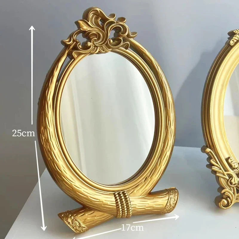 Miroir de table ovale doré à pied torsadé, hauteur 25 cm et largeur 17 cm